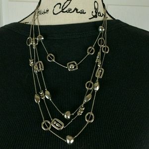 Layered silver tone geometric necklace, 19" long